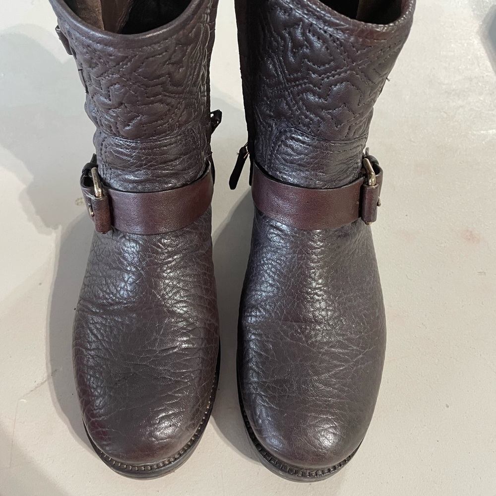 Tory Burch brown leather boot.